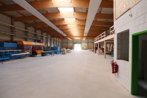 Die hochmoderne ECO-TIMBER Produktionshalle mit der K2 Industry von Hundegger